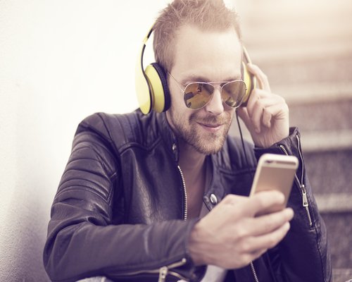 Man listening to relaxing music with headphones
